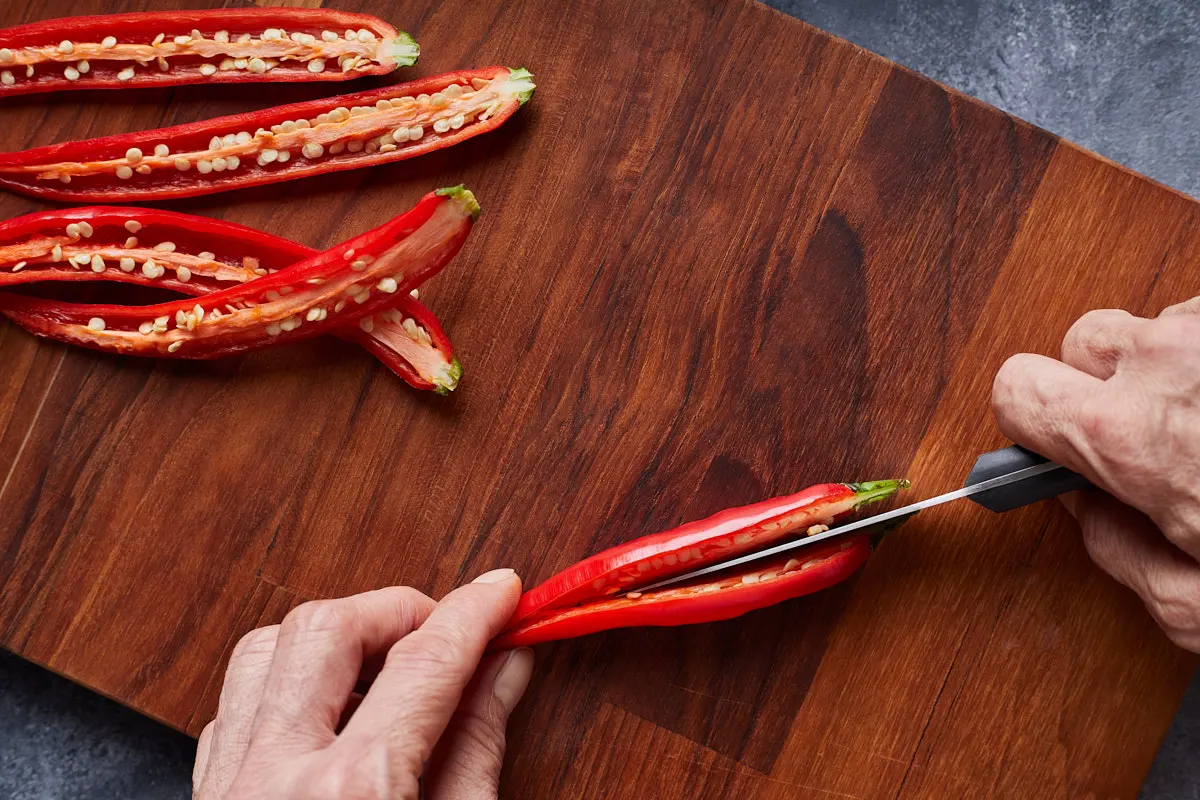 Cut chili in half lengthway.