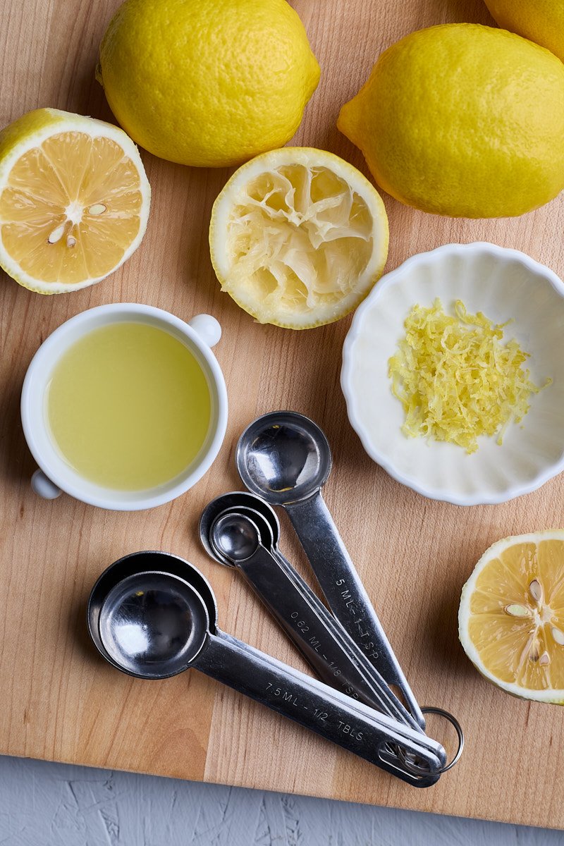 There’re  3 tablespoons of juice and 2 tablespoons of zest from one medium lemon.