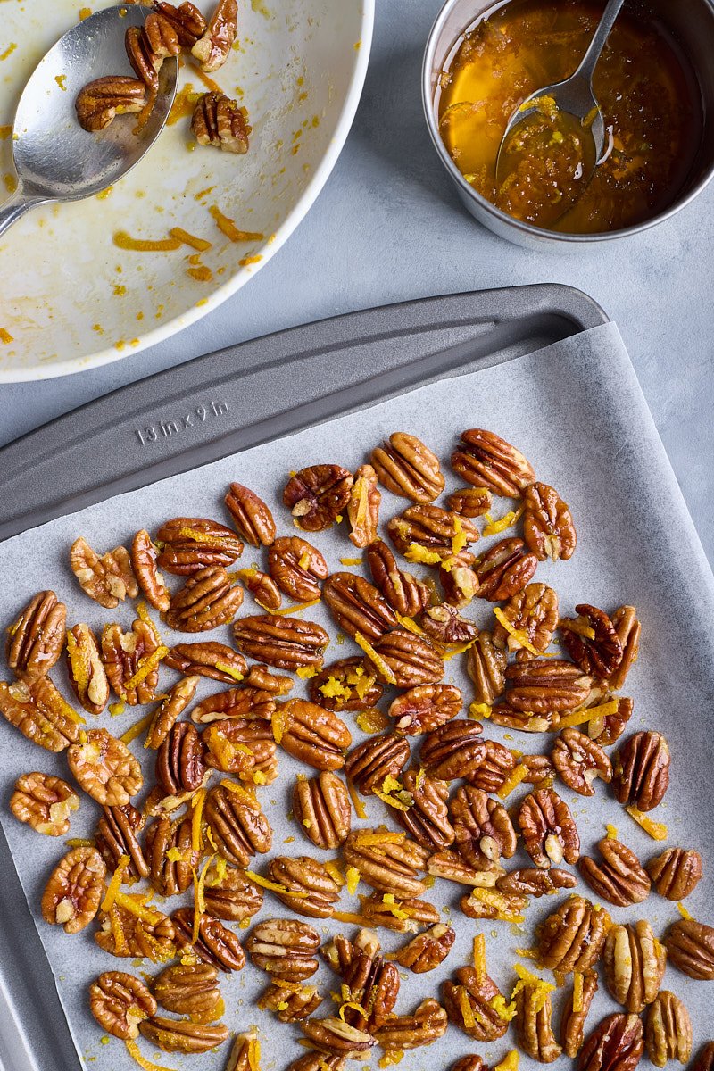 Spread the nuts mixture on a single layer on a baking sheet.