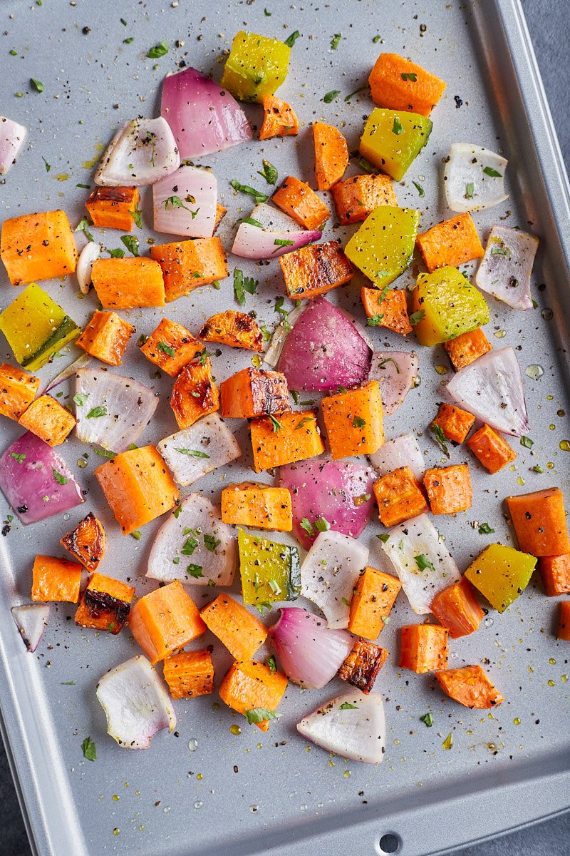 Easy roast veggies, spread carrots, yellow squash, red onion in single layer on baking sheet
