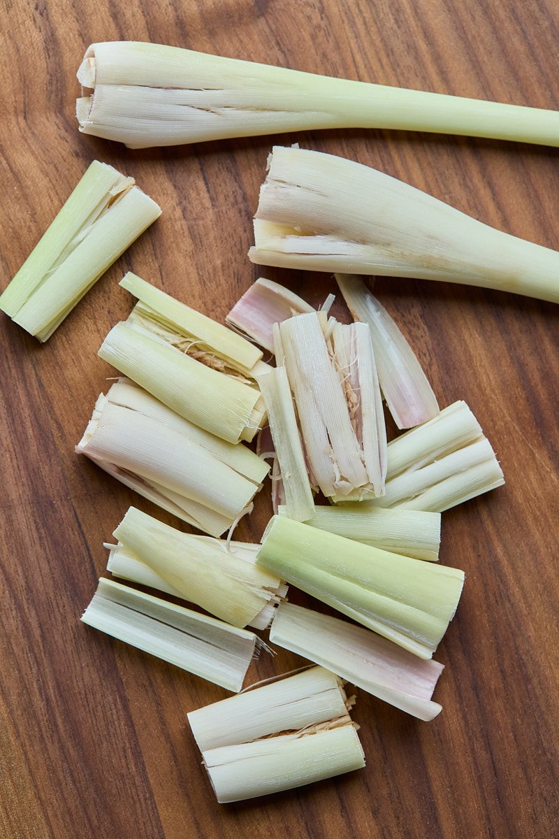 Smash the lemongrass by using the back of a knife pound hard on the bulb to lightly smash it.