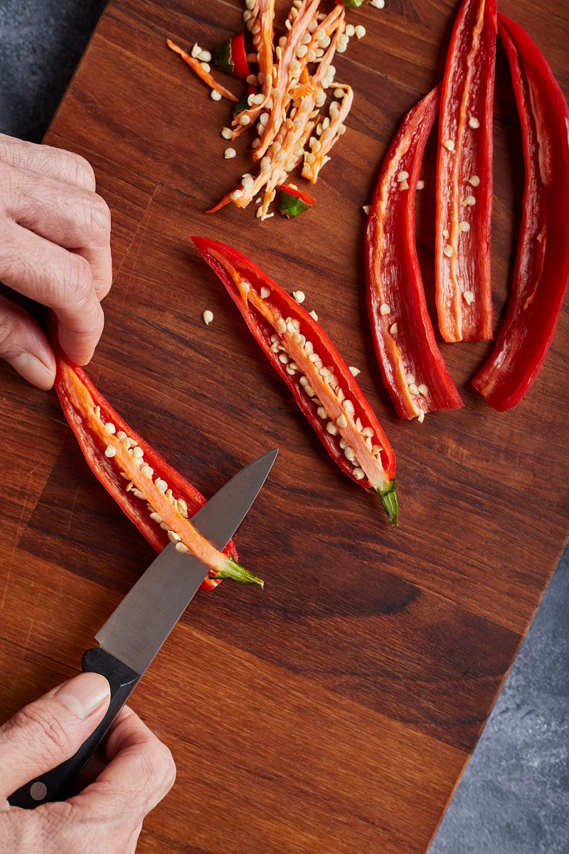 Remove the seeds and white membrane.